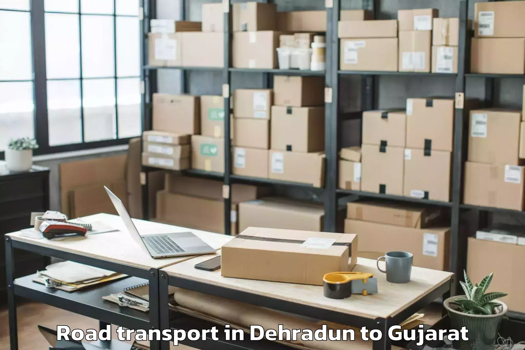 Book Your Dehradun to Limbdi Road Transport Today